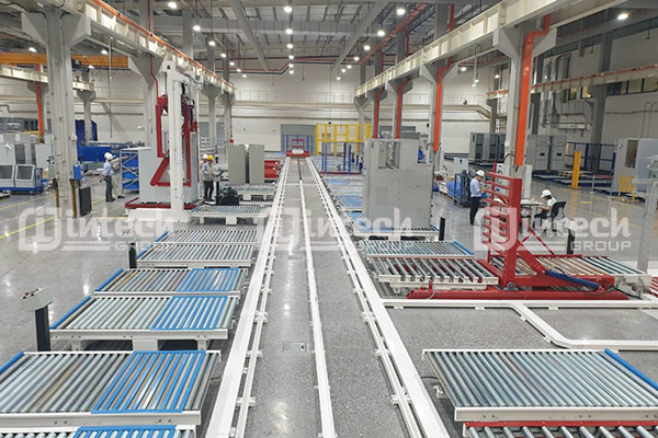 Ứng dụng băng tải con lăn trong kho hàng và logistics